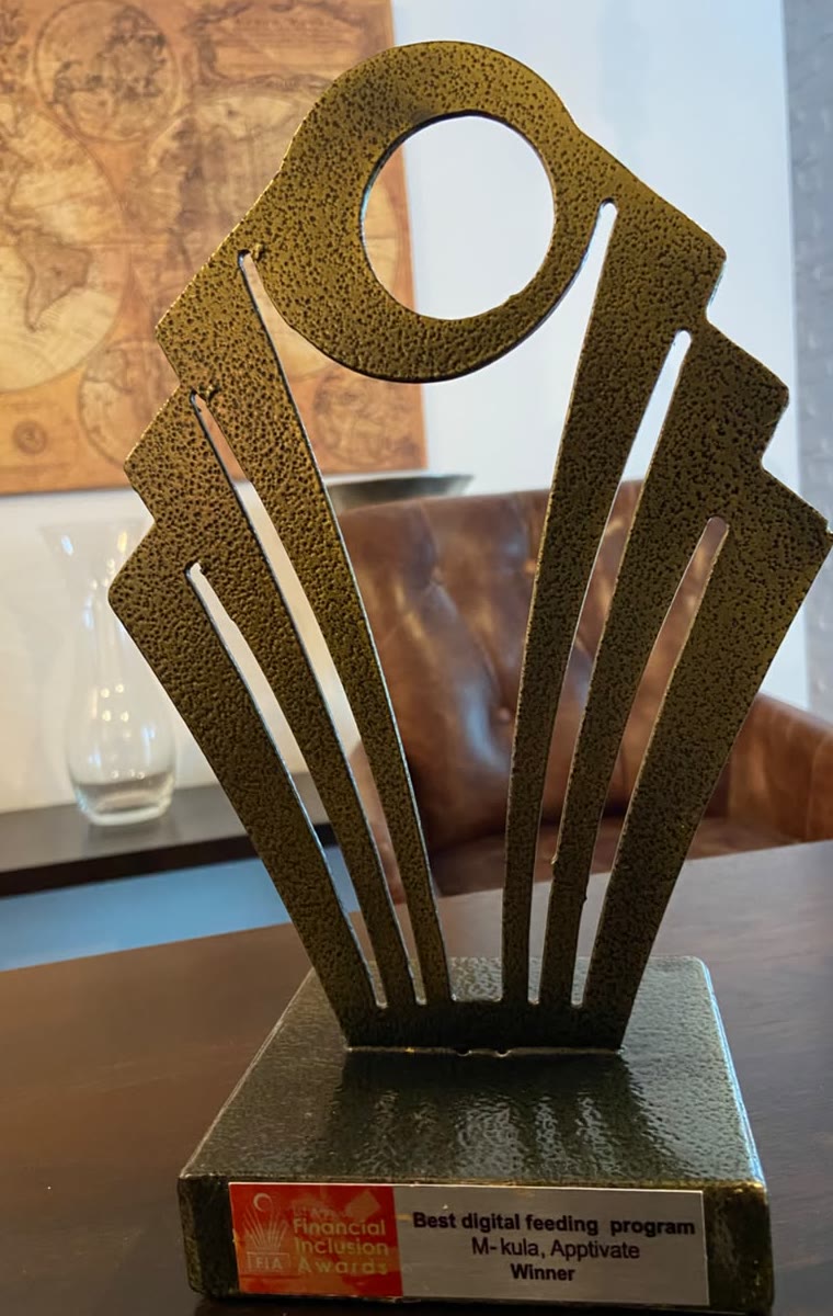 Financial Inclusion Awards trophy for Best Digital Feeding Program, won by M-Kula, Apptivate